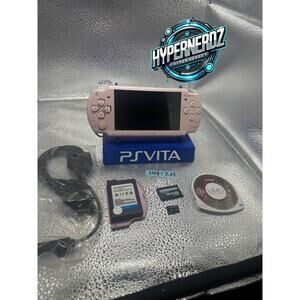 Pink psp 2000 w/ accessories, new battery, no noise!